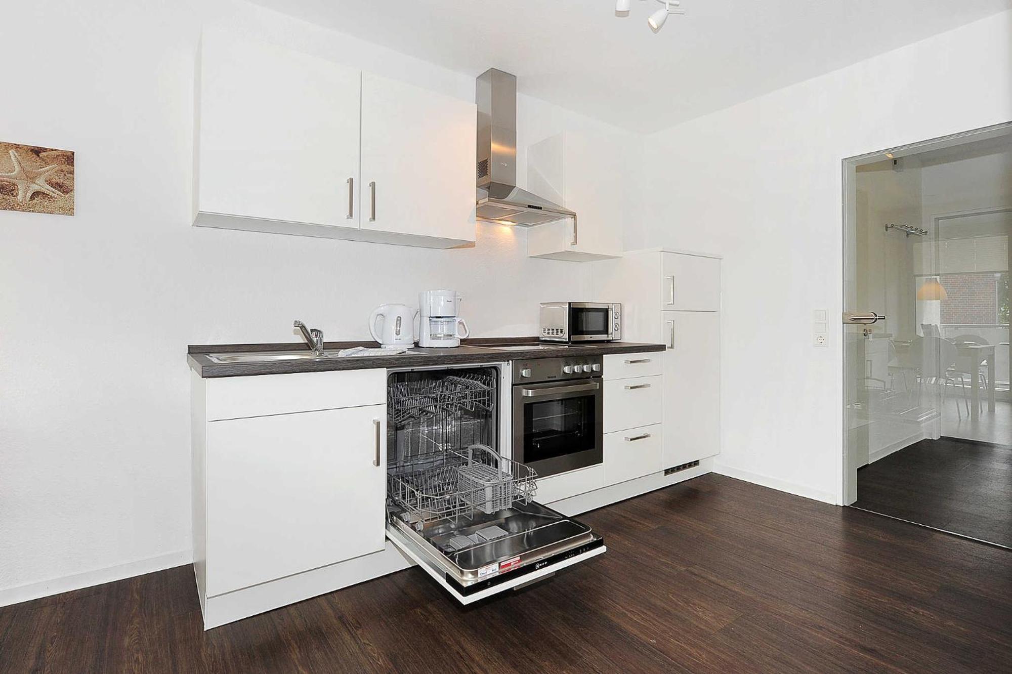 Haus Kunterbunt Apartment Bensersiel Bagian luar foto