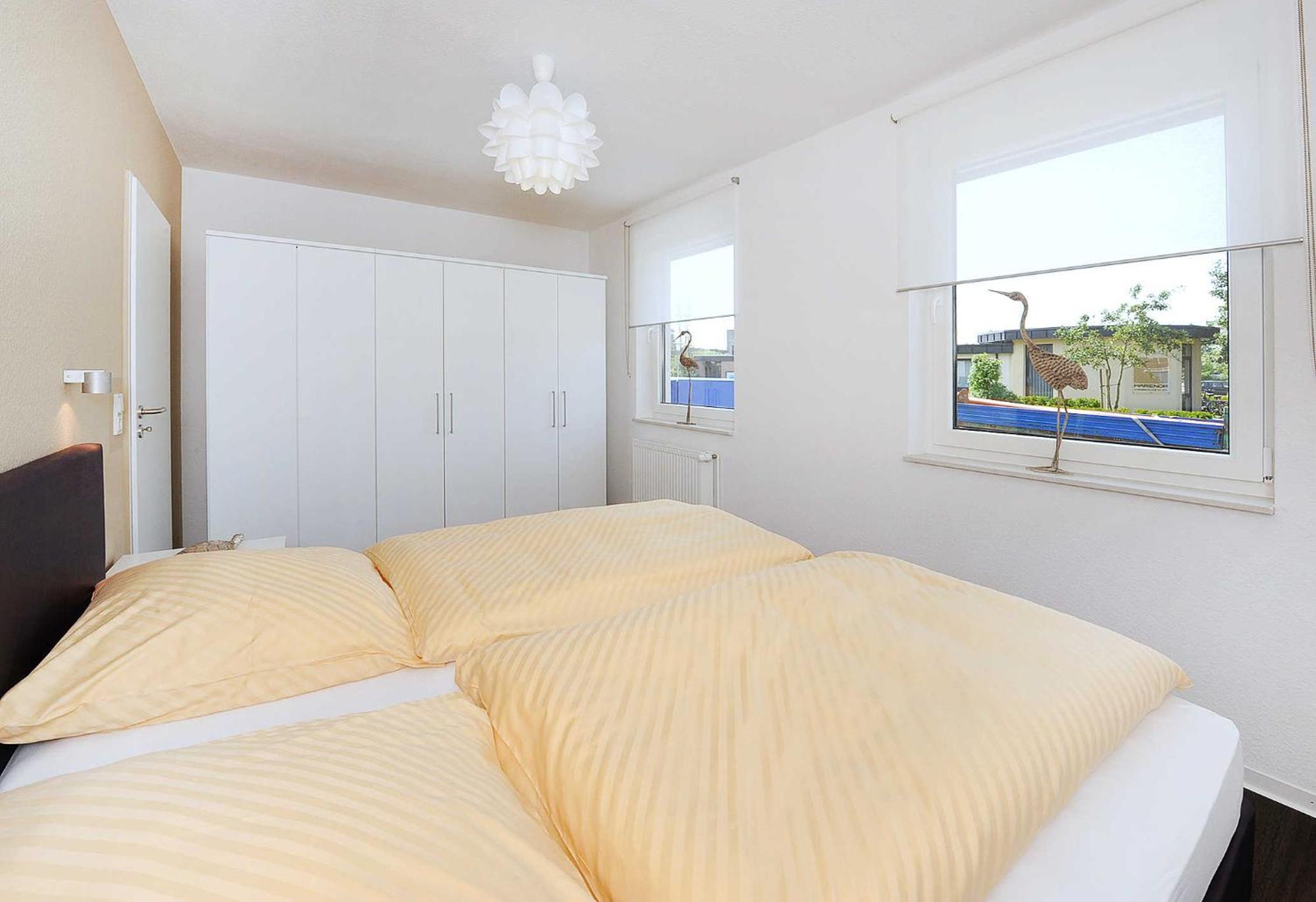Haus Kunterbunt Apartment Bensersiel Bagian luar foto